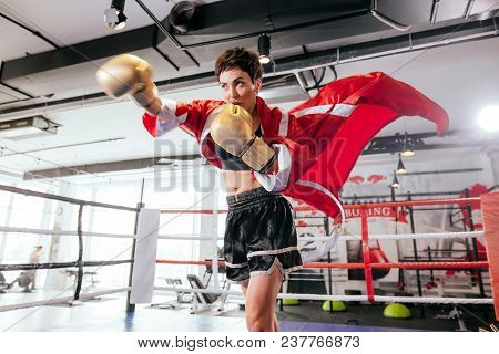 Professional Female Boxer Showing Master Class How To Strike Enemy On Ring. Strike. Final Blow. Teac