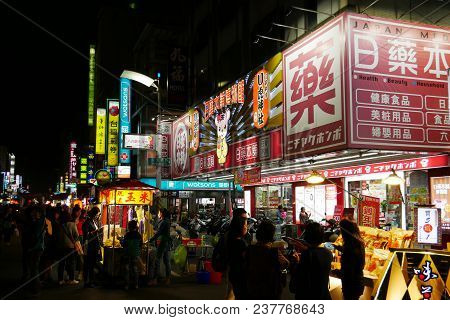 Kaohsiung, Taiwan. December 1, 2017: Liuhe Night Market Is Located Conveniently At The Heart Of Kaoh