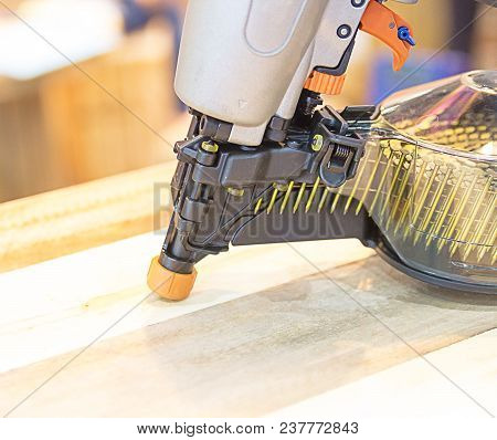 Nail Gun On Table In The Industrial Factory