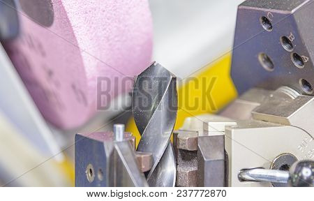 Drill Sharpening Machine By Grindstone In The Industrial Factory