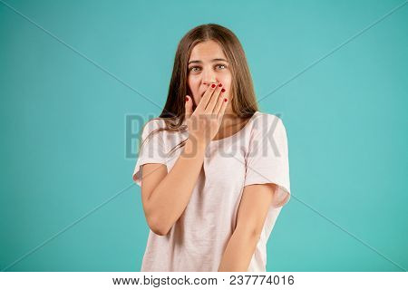 Close-up Portrait Of A Young Darling Woman Model Touching Her Mouth. Close Mouth. Yawning Female. Ch