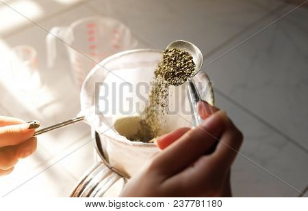 Thai Woman Making A Milk Green Tea Using Tea Filter Bag..