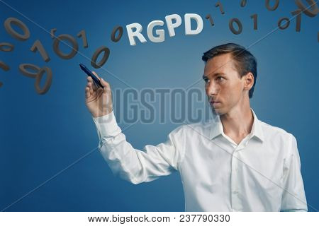 RGPD, Spanish, French and Italian version version of GDPR: Reglamento General de Proteccion de datos. General Data Protection Regulation. Young man working with information.