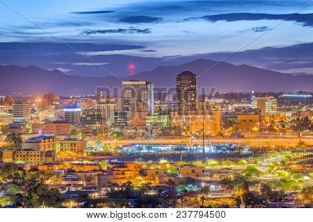 Tucson, Arizona, USA downtown skyline from Sentinel Peak at dawn.