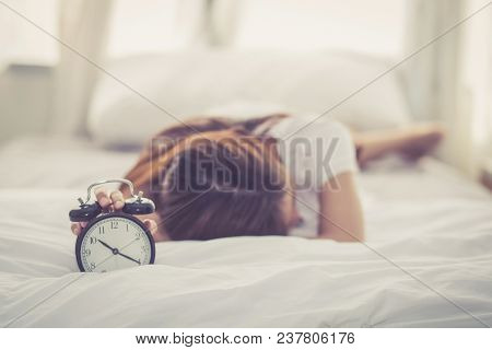 Beautiful Young Asian Woman Wake Up In Morning Annoyed Alarm Clock Holding Hand, Girl Hurry Wake Lat