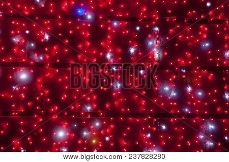 Red Christmas Lights Background. Creating A Festive Mood
