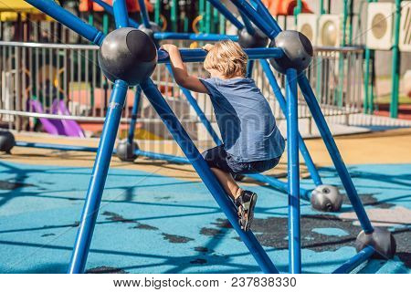Funny Cute Happy Baby Playing On The Playground. The Emotion Of Happiness, Fun, Joy.