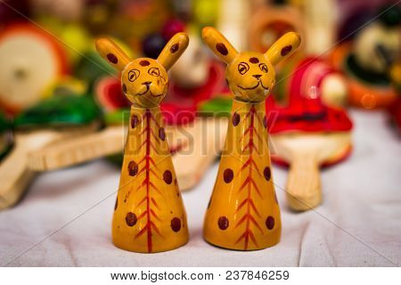 Two Yellow Wooden Giraffe Figure Vintage Channapatna Toy