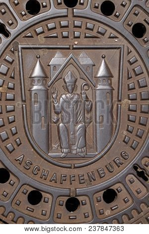 ASCAFFENBURG, GERMANY - JULY 07: Coat of Arms of Aschaffenburg on the manhole cover in Aschaffenburg, Germany on July 07, 2017.