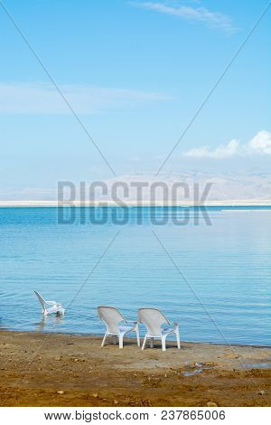 Chairs On Beach, Lowest Salty Lake In World Below Sea Level Dead Sea, Full Of Minerals Near Luxury V