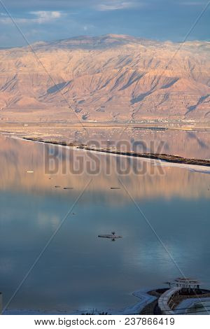 Sunset Over Lowest Salty Lake In World Below Sea Level Dead Sea, Full Of Minerals Near Luxury Vacati