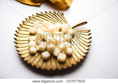 Bengali Sweet Chena Murki Served In A Golden Plate, Selective Focus