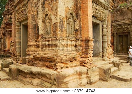 Siem Reap, Cambodia - August 10, 2008: View To The Stone Carving At The Walls Of The Ruins Of The Pr