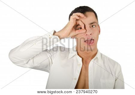 Young Handsome Guy Is Fooling Around. Emotional And Funny. Gesture Monocle