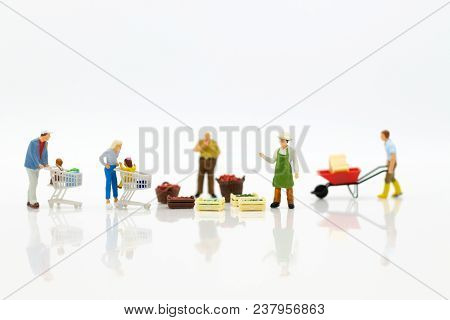 Miniature People : Spending Cash For Shopping In The Market. Image Use For Marketing, Merchant Middl