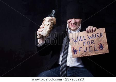 Photo Of A Happy Alcoholic Homeless Businessman With Cardboard Sign.