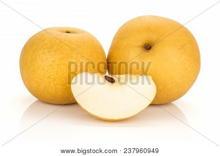 Two Chinese Golden Pears With One Slice Nashi Variety Isolated On White Background