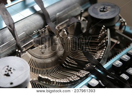 The Old Typewriter In Beams Of The Sun. In Natural Lighting, In Light From A Window. Retro Style. Ol