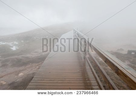 The Wooden Ramp At The Gunnuhver Hot Spring Leads Into The Mist