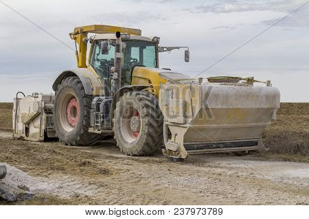Yellow Loader At A Loamy Construction Site