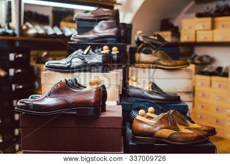 Men's shoes waiting for customers to buy them in store