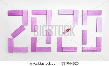 Pinck Caption 2020 Made Of Blocks On A White Background. View From Above