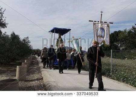 Orihuela, Spain- November 24, 2019: Parishioners Carrying The Beautiful And Old Virgin Of The Miracl