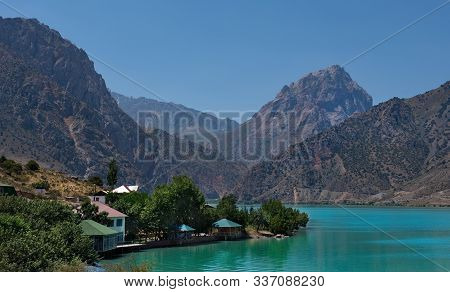 Tajikistan. The Pearl Of The Pamir Tract Is The Amazing Mountain Lake Iskanderkul.