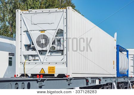 Refrigerated Container 20-foot-long On The Railway Platform.