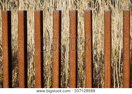 Rusty Iron Pipes For Fencing Or Fence. The Textured Background. Country Life, Straight Lines, Geomet