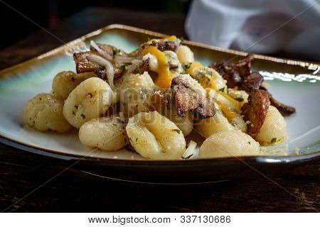 Four-cheese Italian Herb Gnocchi With Fried Sliced Mushrooms