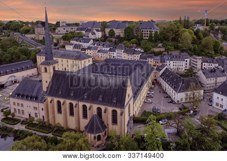 Alzette River, Church Of St Jean Du Grund And Abbey De Neumunster In Old Town Luxembourg City From T
