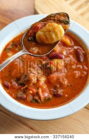 Italian Cuisine Sausage Gnocchi Soup With Tomato Basil Broth