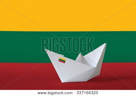 Lithuania Flag Depicted On Paper Origami Ship Closeup. Handmade Arts Concept