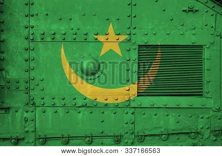 Mauritania Flag Depicted On Side Part Of Military Armored Tank Closeup. Army Forces Conceptual Backg