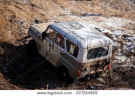 Khabarovsk, Russia - Nov 11, 2019: Jeep Uaz Overcomes Obstacles In The Forest.