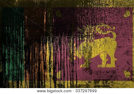 Sri Lanka Flag Depicted In Paint Colors On Old And Dirty Oil Barrel Wall Closeup. Textured Banner On