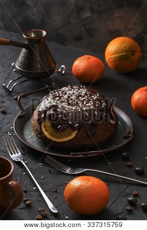 Homemade Winter Dessert. Traditional British Steam Chocolate Pudding With Oranges And Clementines On