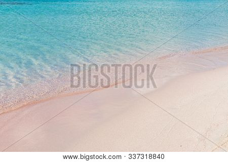 Soft Waves Of The Sea On The Pink Sand And Beautiful Beach With Cliffs.coast Of Crete Island In Gree