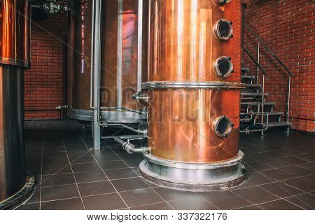 Industrial Equipment For Brandy Production.
Copper Still Alembic Inside Distiller To Distill Grapes 