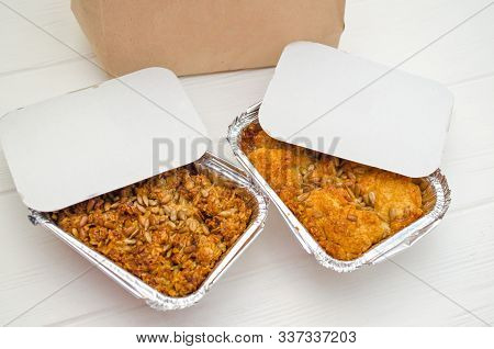 Indian Food, Fruit Pies, Subhadra And Mithai, In Foil Plates On A White Background, Sprinkled With S