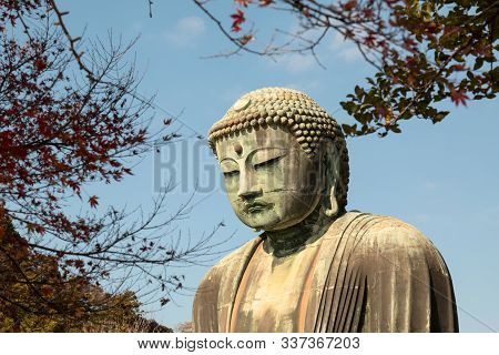 Colse Up Of Daibutsu Statue At Kotoku-in Temple; Monumental Outdoor Bronze Statue Of Amida Buddha Wh