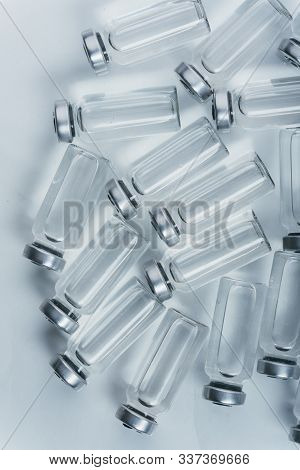 Glass Medical Ampoule Vial For Injection. Medicine Is Dry White Drug Penicillin Powder Or Liquid Wit