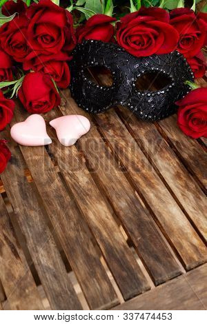 Valentines Day Date Card With Rose Flowers And Two Pink Hearts, Copy Space On Wooden Table