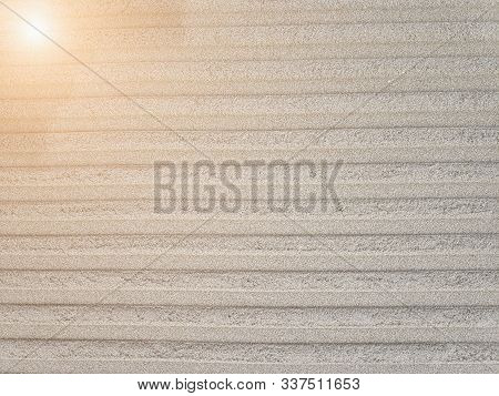 Beautiful Artificial Pattern On Sand Arter Going A Track Or Any Other Transport. There Is Sun Lights