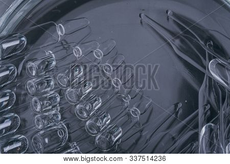 Glass Medical Ampoule Vial For Injection. Medicine Is Liquid Sodium Chloride With Of Aqueous Solutio