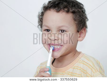 Little Boy Brushing His Teeth With An Electric Tooth Brush Stock Image With White Background Stock P
