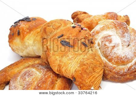 nějaké pečivo, jako čokoládové croissanty a ensaimadas