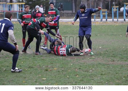 Odessa, Ukraine November 24, 2019: Local Rugby Clubs Engaged In Fierce Fight On Green Unequipped Fie