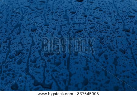 Water Blue Drops On Glass. Autumn Cold Outside.
